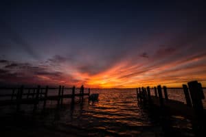 photo coucher de soleil nuage mer ponton orange orangé ciel