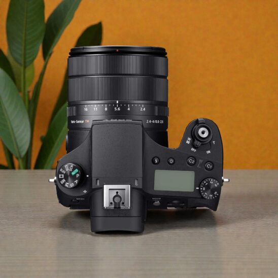 Sony RX10 IV high-end bridge camera, top-down view. Premium digital camera with zoom lens for photography enthusiasts.
